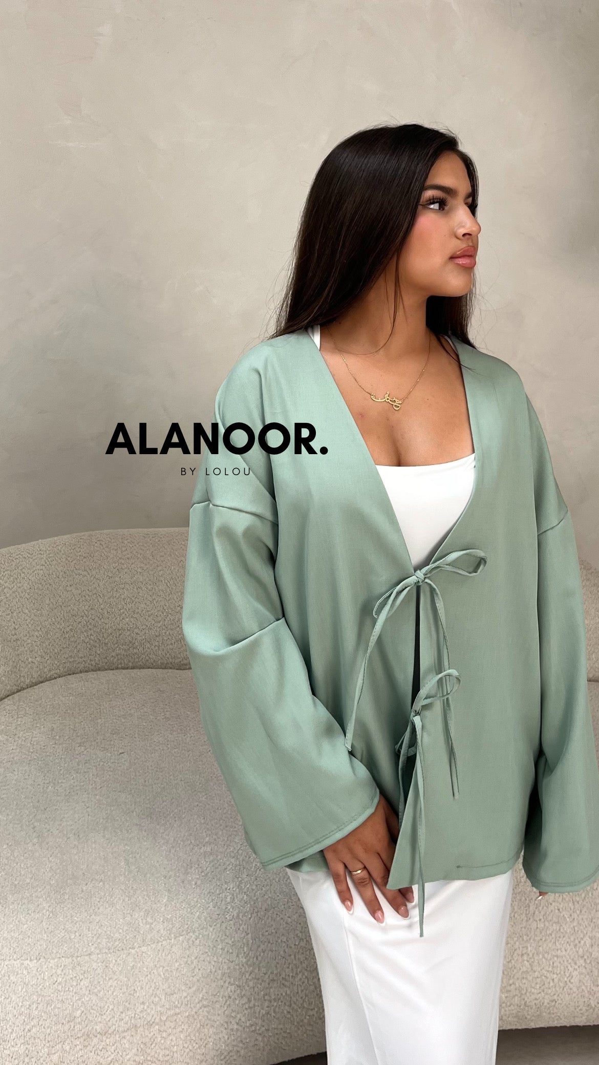 Blusa Lazos azul turquesa