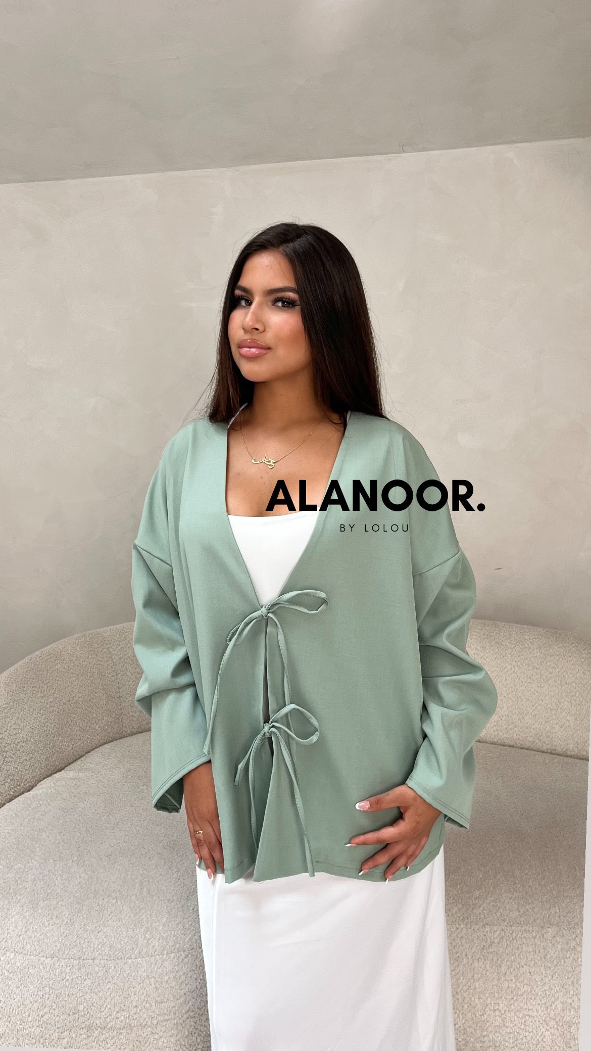Blusa Lazos azul turquesa
