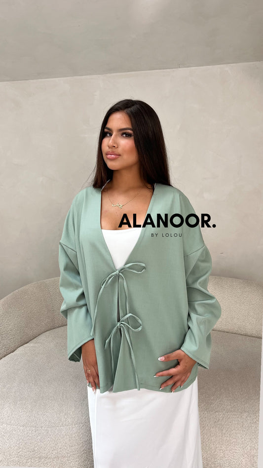 Blusa Lazos azul turquesa