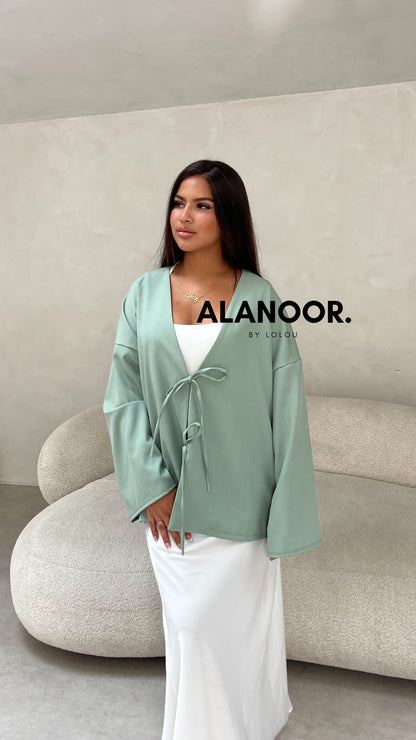 Blusa Lazos azul turquesa